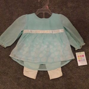 Light blue blouse with white tights